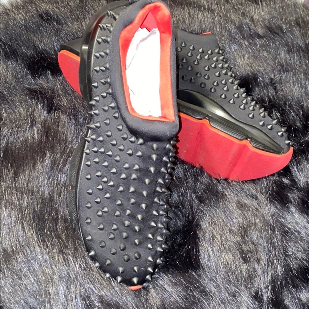 Red and black sneakers